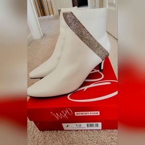 Ivory boots by Impo size 8